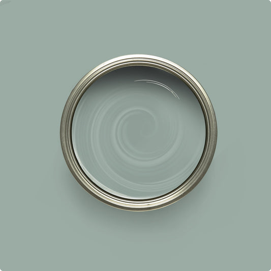 Close-up of a circular metal object on a light blue background